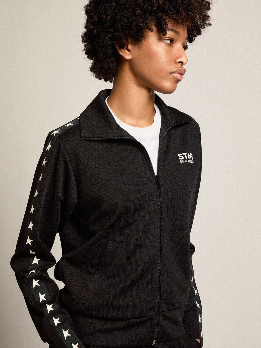 schwarzes damen-sweatshirt mit reißverschluss und weißen sternen