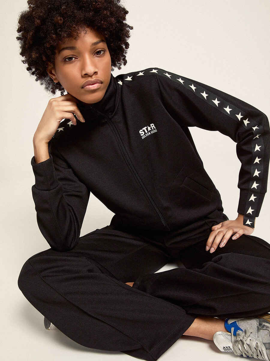 schwarzes damen-sweatshirt mit reißverschluss und weißen sternen