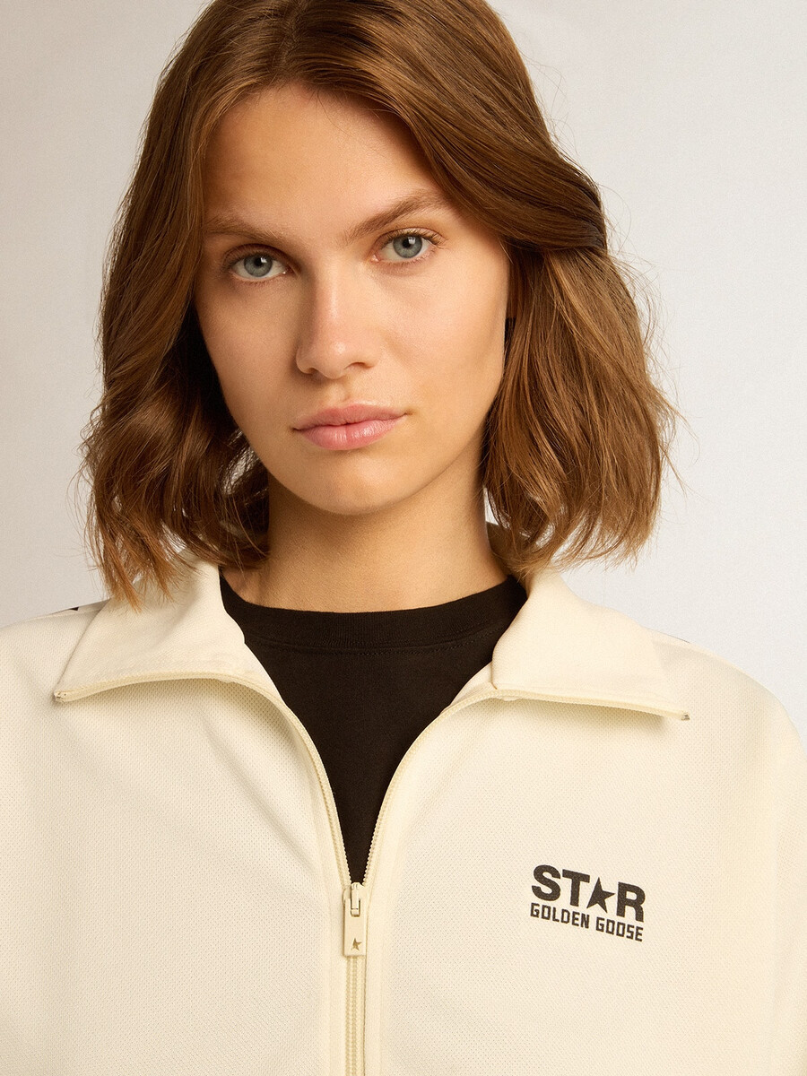 weißes damen-sweatshirt mit reißverschluss weißem streifen und schwarzen sternen