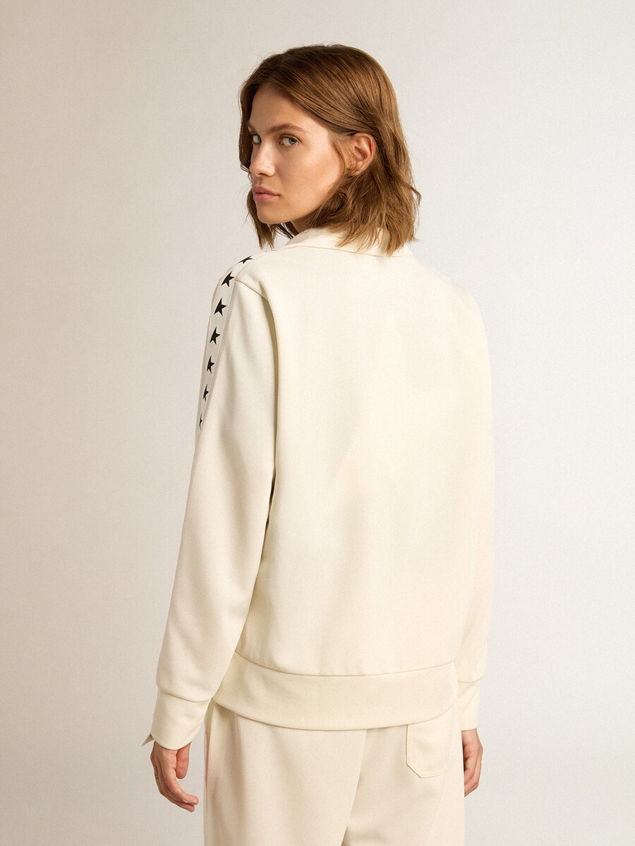 weißes damen-sweatshirt mit reißverschluss weißem streifen und schwarzen sternen
