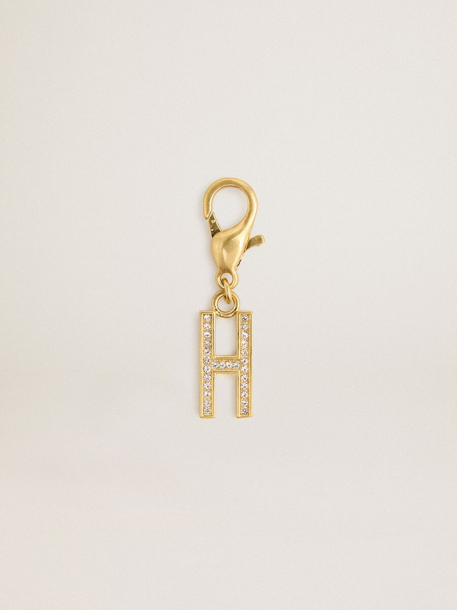 anhänger mit dem buchstaben h aus goldfarbenem messing mit kristallen