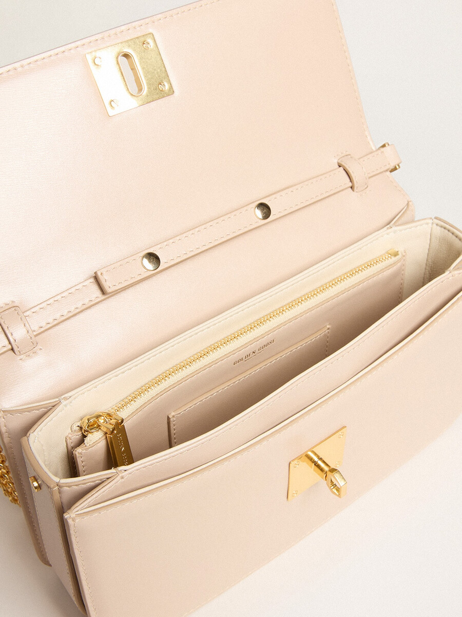 gioia tasche aus hellrosa genarbtem leder mit goldenen details
