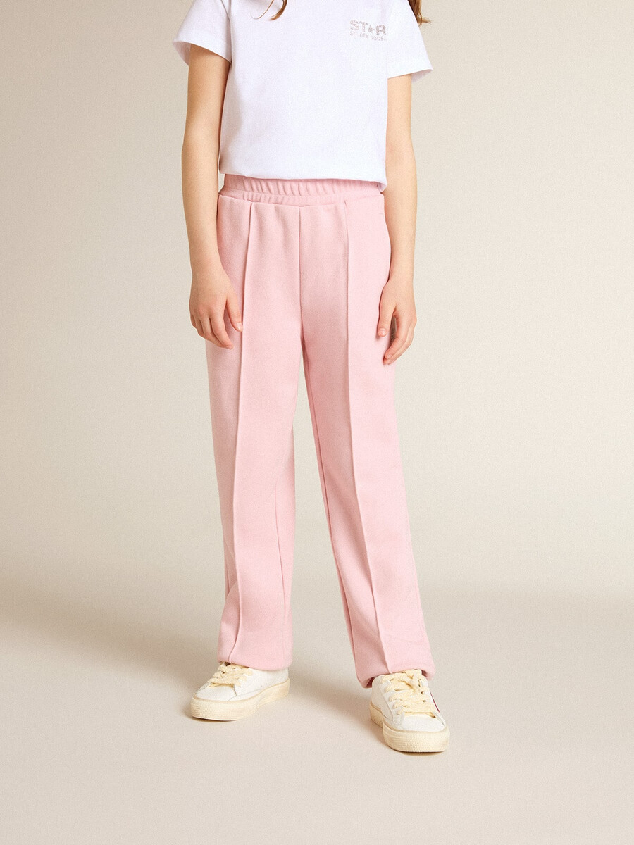 pinkfarbene jogginghose mit glitzerstern auf der vorderseite