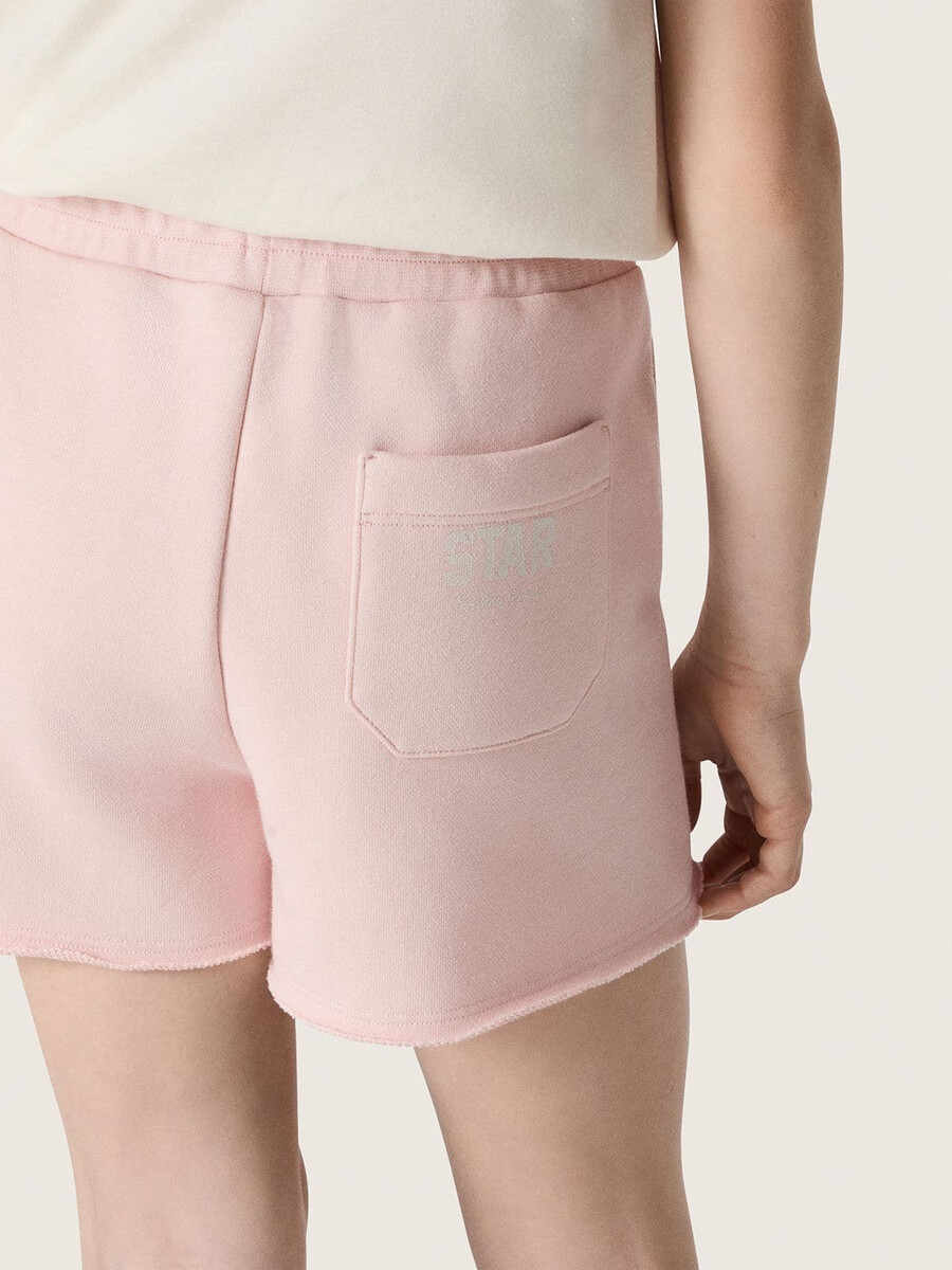 mädchenshorts mit sternenmuster aus rosa baumwolle mit aufnäher und logo