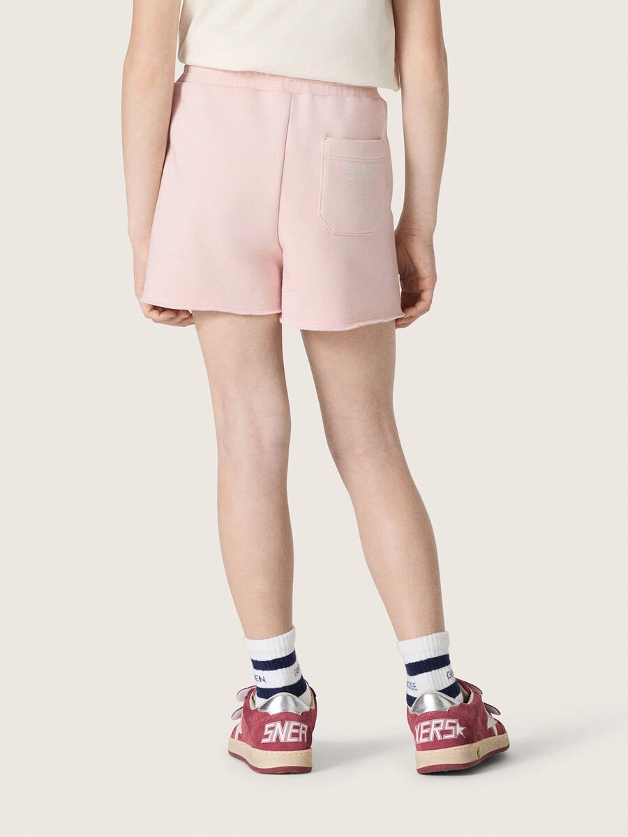 mädchenshorts mit sternenmuster aus rosa baumwolle mit aufnäher und logo