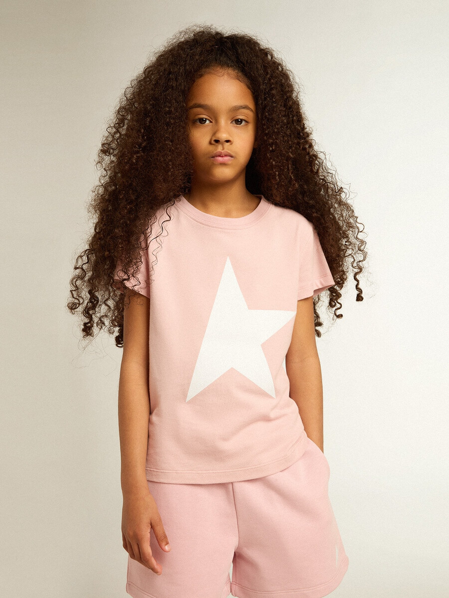mädchen-t-shirt in rosa mit weißem logo und großem stern