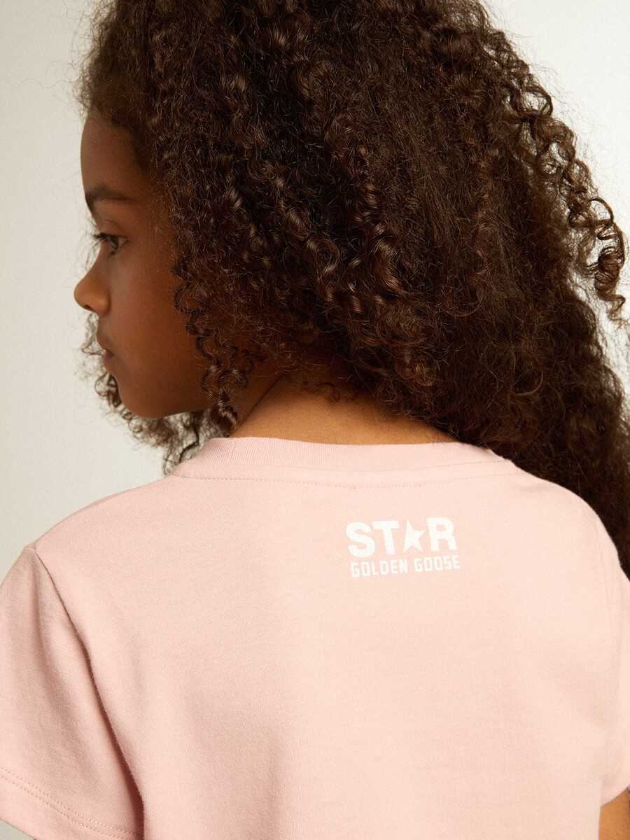 mädchen-t-shirt in rosa mit weißem logo und großem stern
