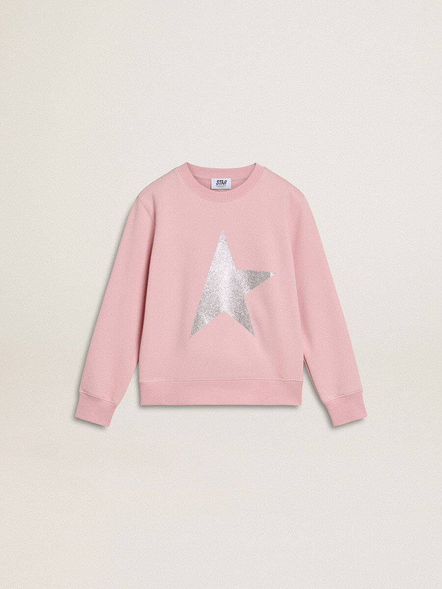 rosa sweatshirt mit großem silbernen glitzerstern auf der vorderseite