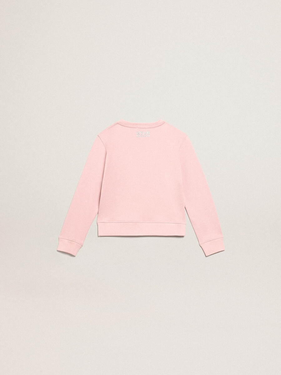 rosa sweatshirt mit großem silbernen glitzerstern auf der vorderseite
