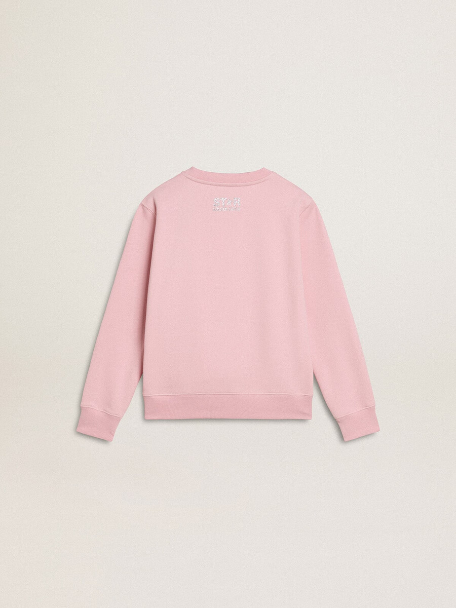 rosa sweatshirt mit großem silbernen glitzerstern auf der vorderseite