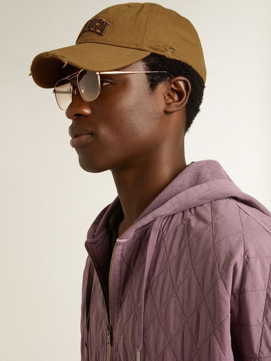 beige baseballkappe aus baumwolle mit used-look