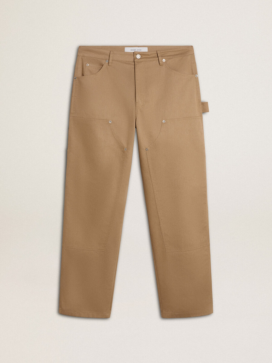 beige herrenhose mit flicken