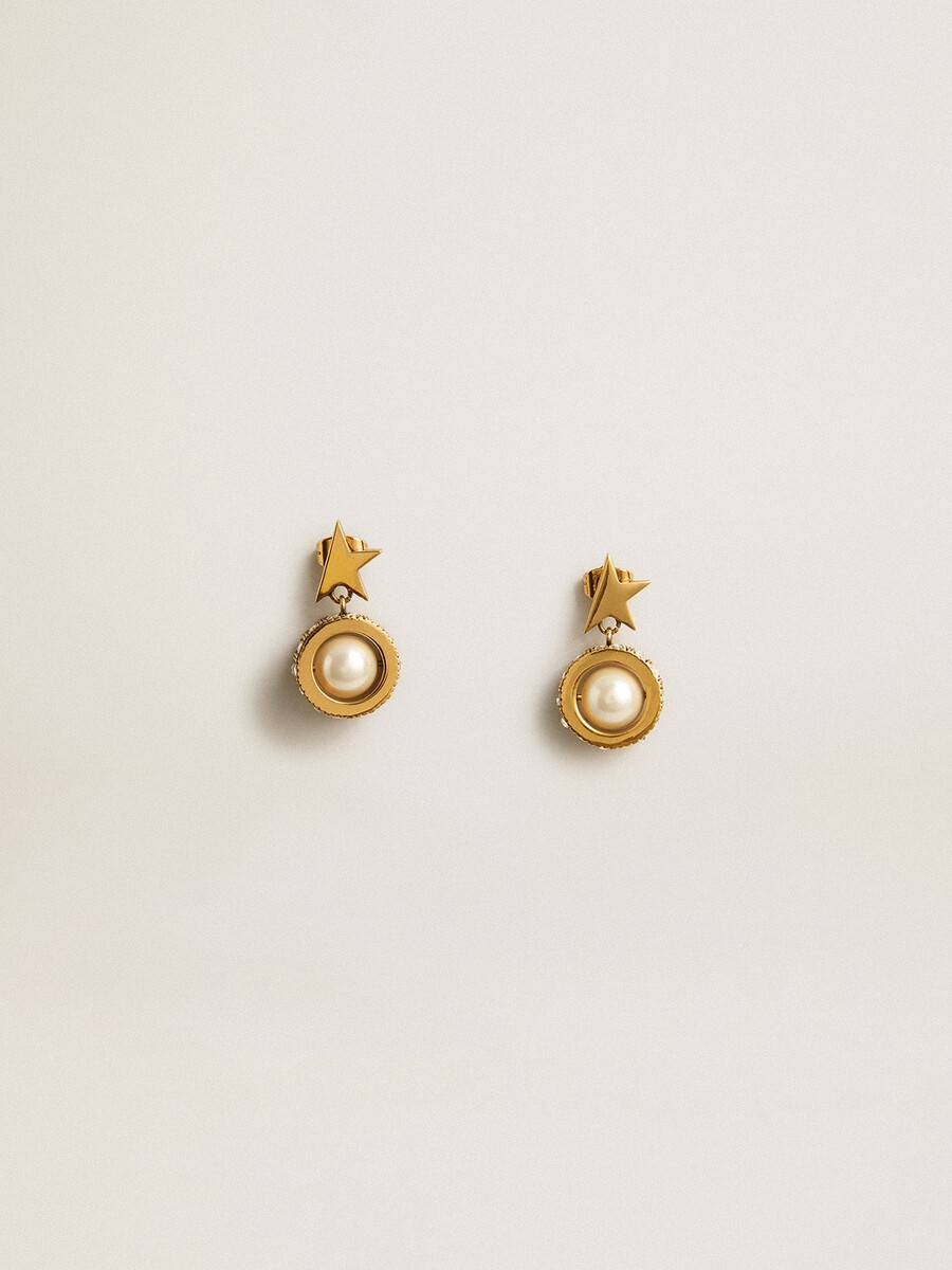 ohrringe mit goldenem stern und perle