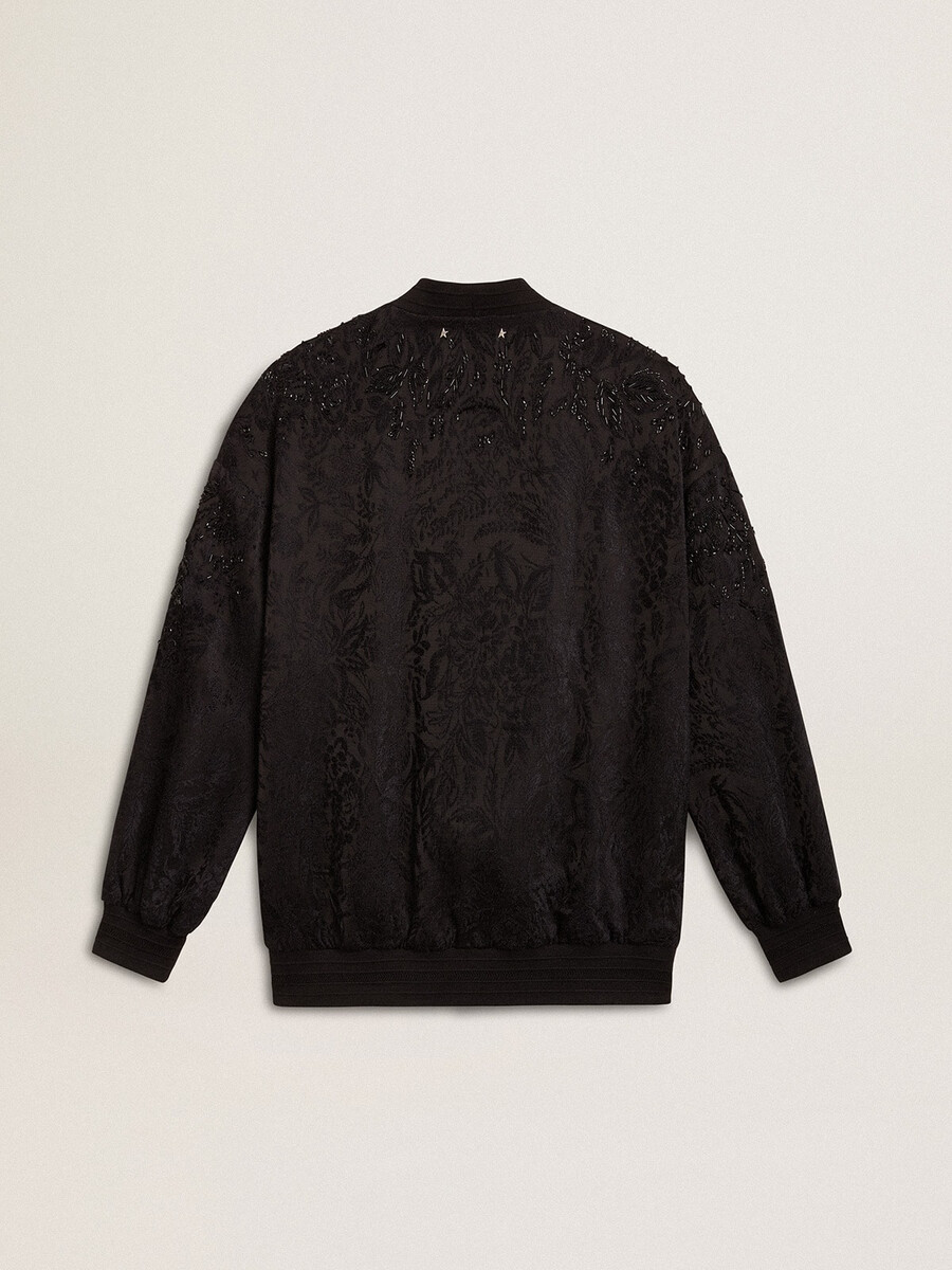 schwarze damenstrickjacke mit ton-in-ton-toile-de-jouy-perlenstickerei