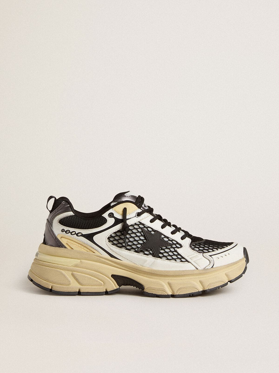 lightstar damenschuh aus weißem leder und schwarzem mesh mit schwarzem tpu-stern