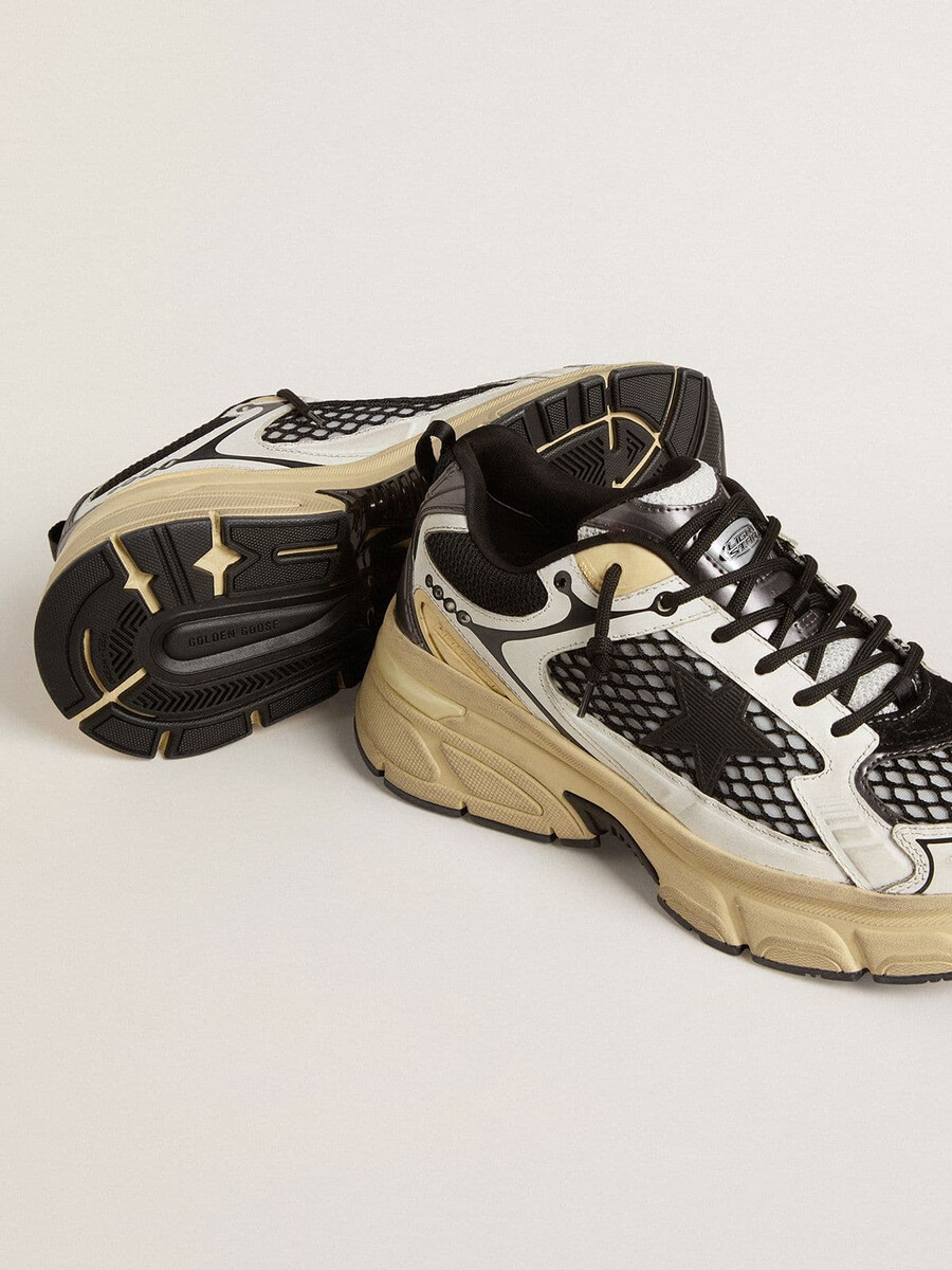 lightstar damenschuh aus weißem leder und schwarzem mesh mit schwarzem tpu-stern