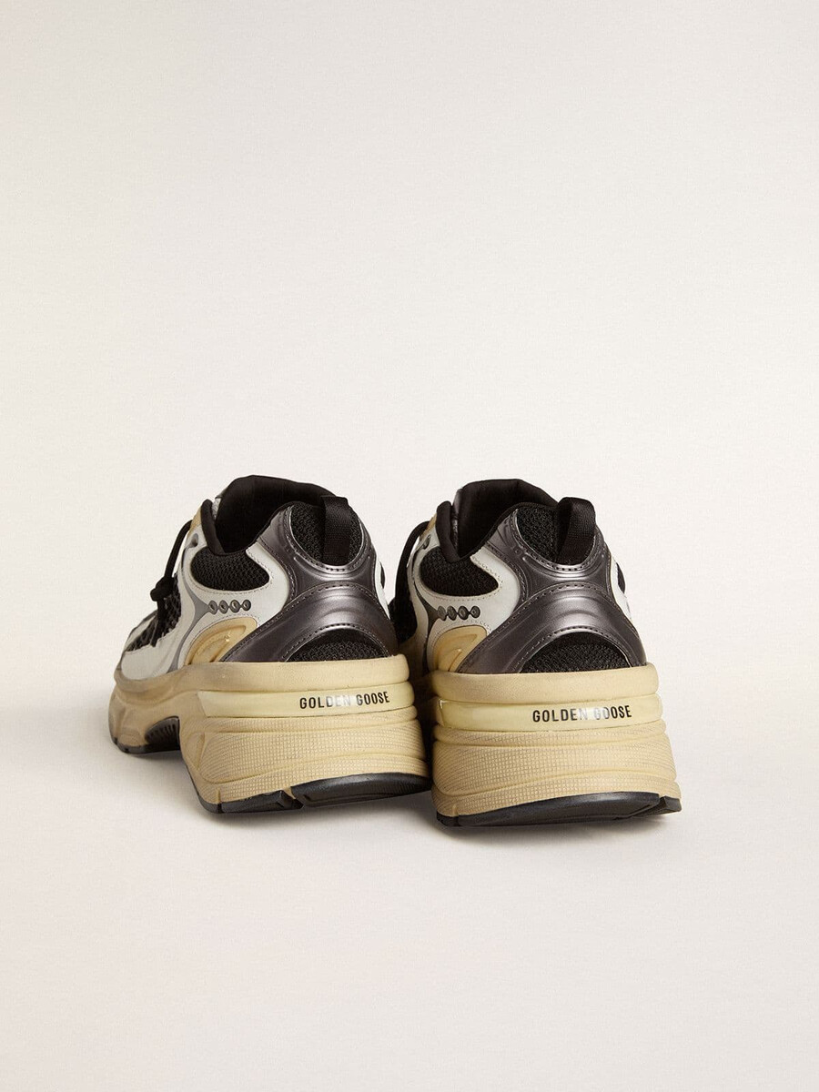 lightstar damenschuh aus weißem leder und schwarzem mesh mit schwarzem tpu-stern