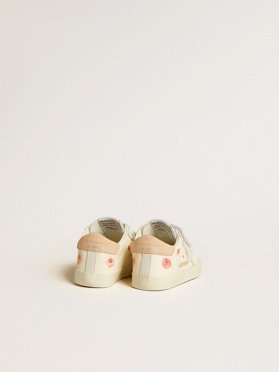 baby-schule aus nappaleder mit rosa rosenmotiv und weißem wildlederstern