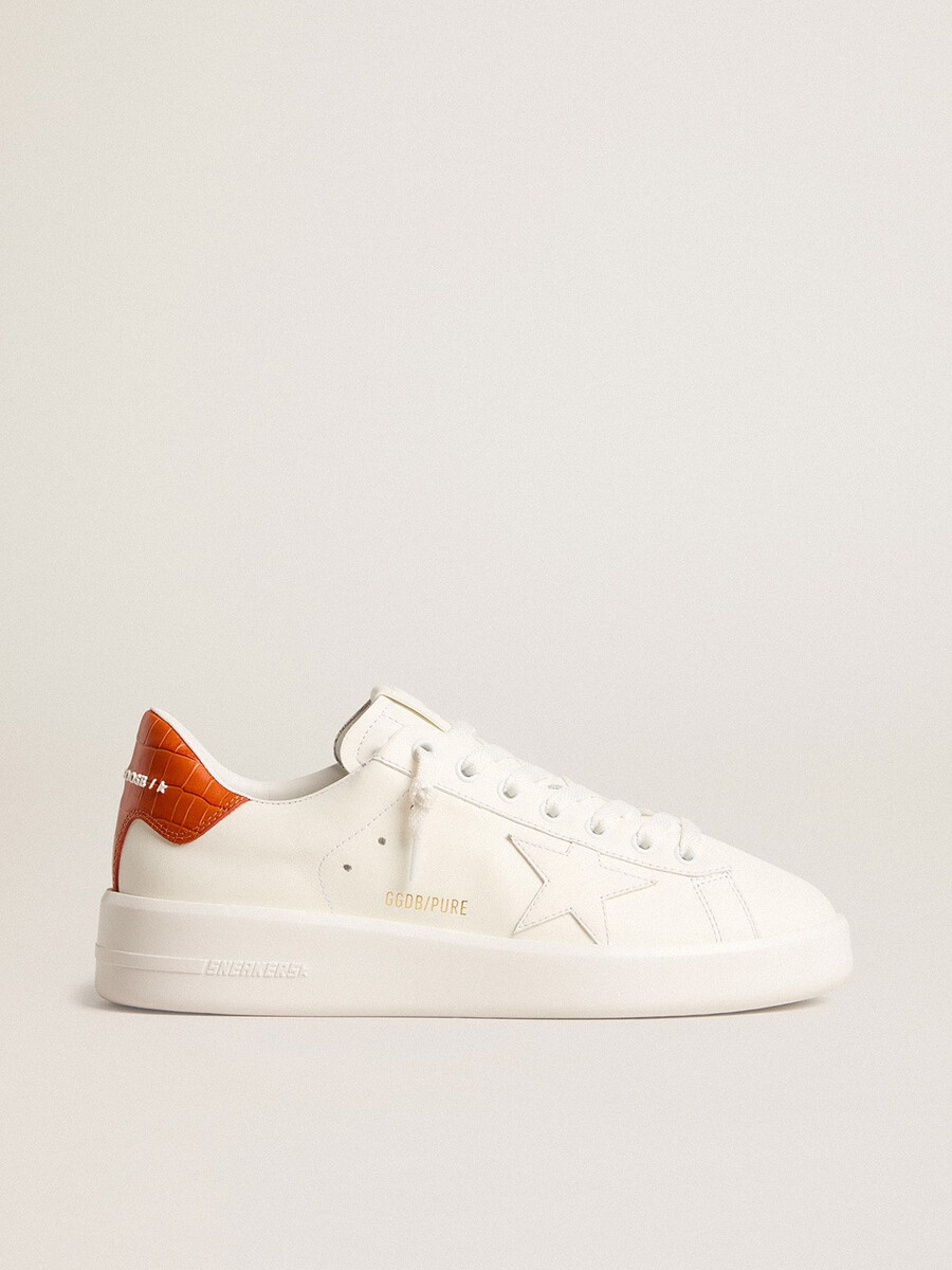 purestar damenschuh mit weißem lederstern und orangefarbener fersenlasche