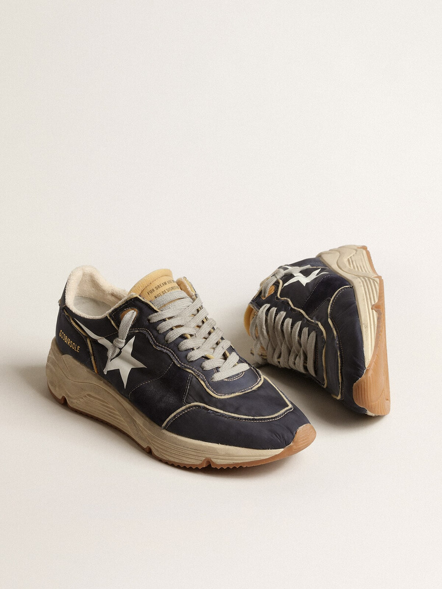 laufsohle aus blauem nylon mit weißem sternaufdruck