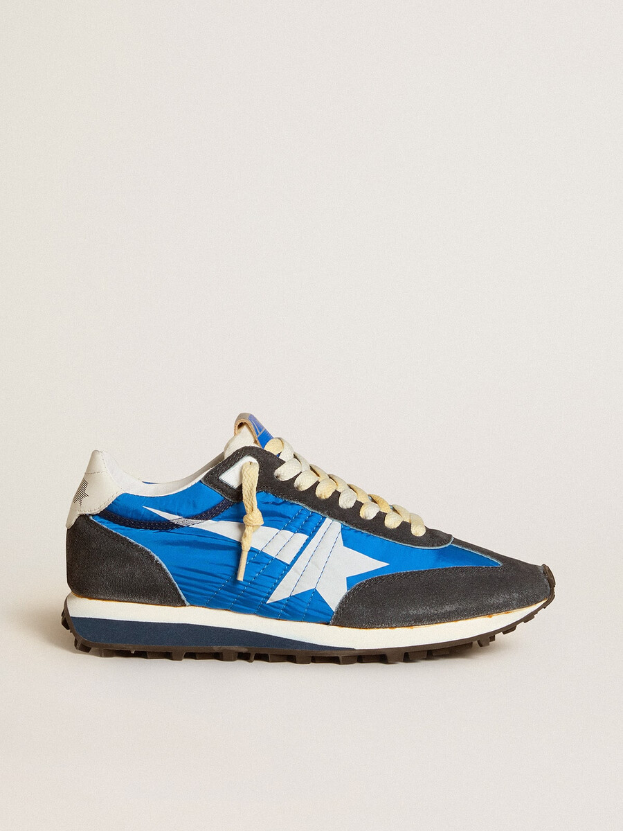 damen-marathonschuh mit blauem nylon-obermaterial und weißem stern