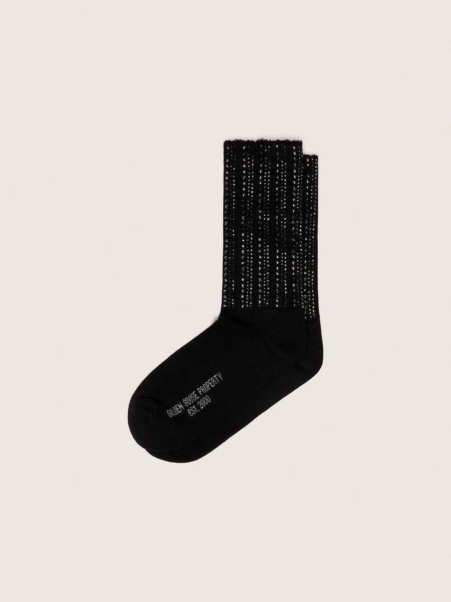 schwarze socken mit used-look-details und strasssteinen