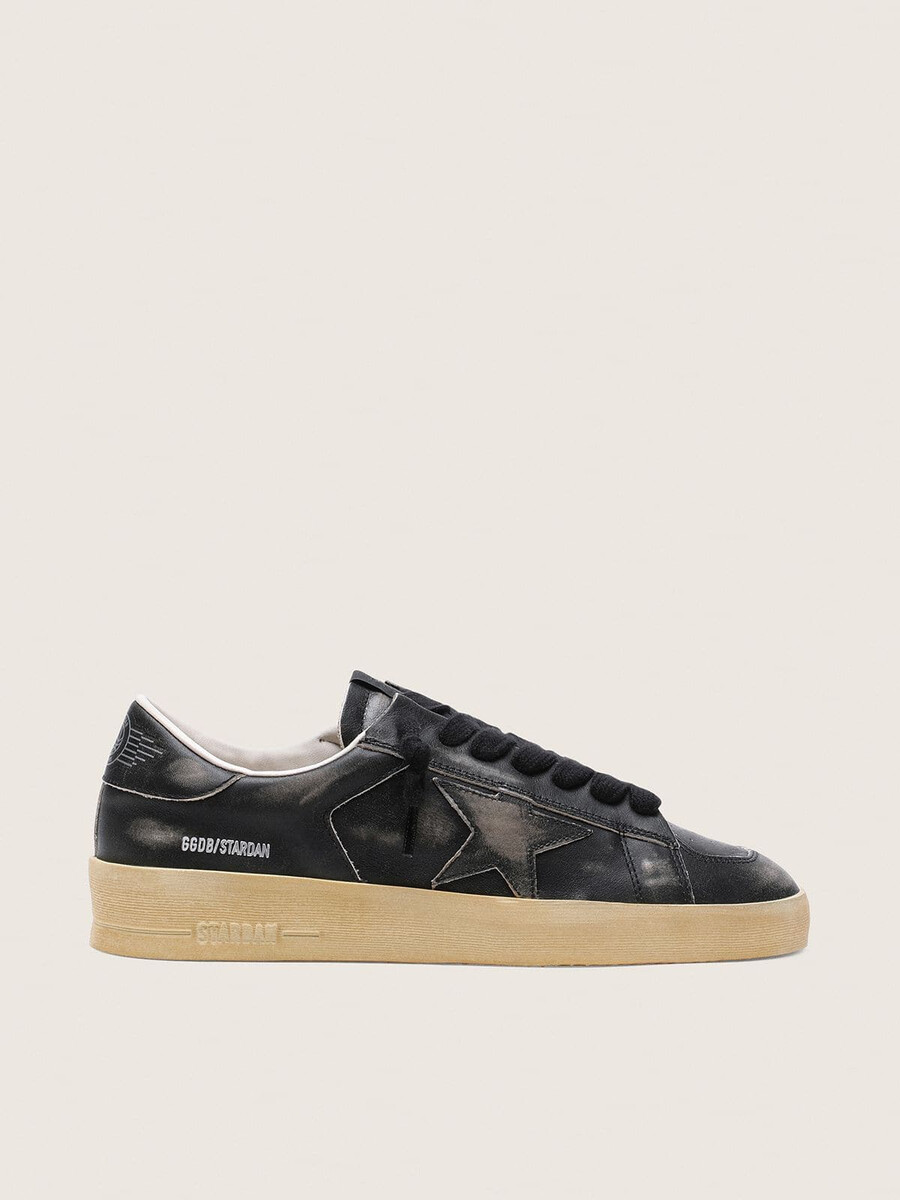 stardan herrenschuhe aus schwarzem leder mit schwarzem lederstern und fersenlasche