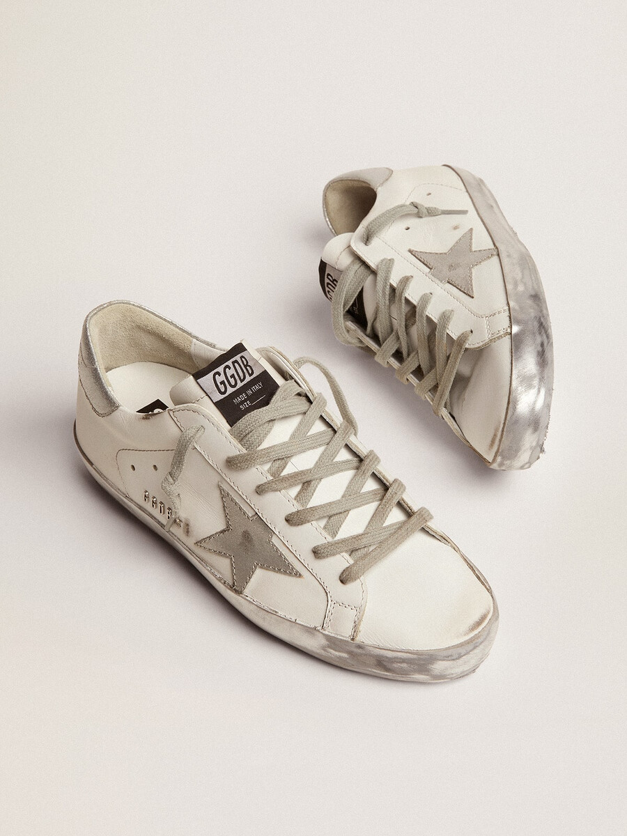 damen-superstar mit silbernem glitzerbesatz und metallnieten-schriftzug
