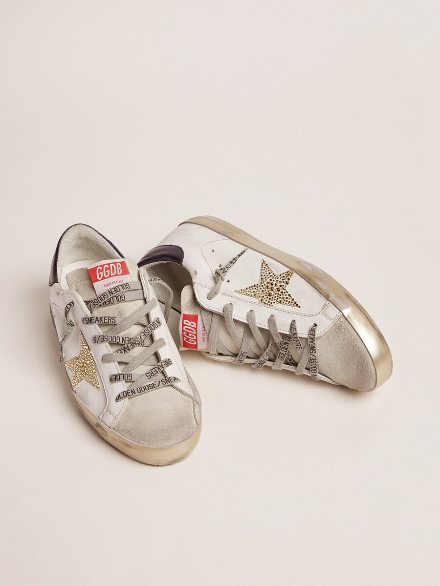 damen-superstar mit blauer fersenlasche und swarovski-kristallstern