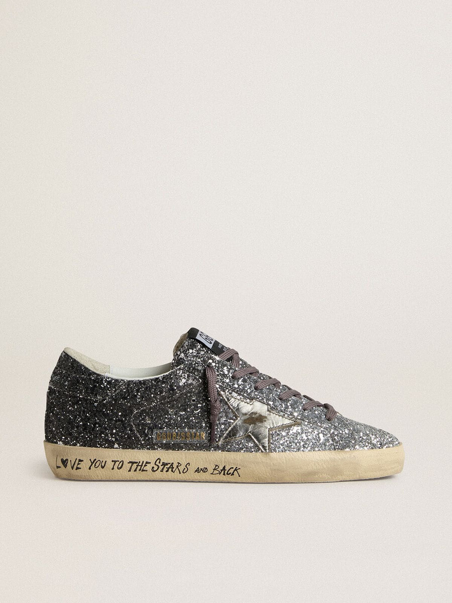 super star damenschuh mit glitzerndem obermaterial und silbernem metallic-lederstern
