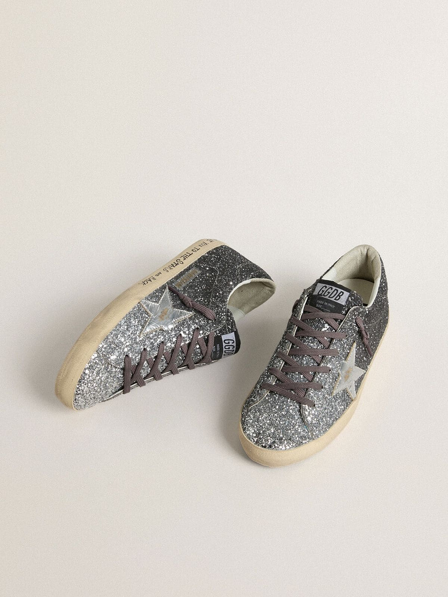 super star damenschuh mit glitzerndem obermaterial und silbernem metallic-lederstern