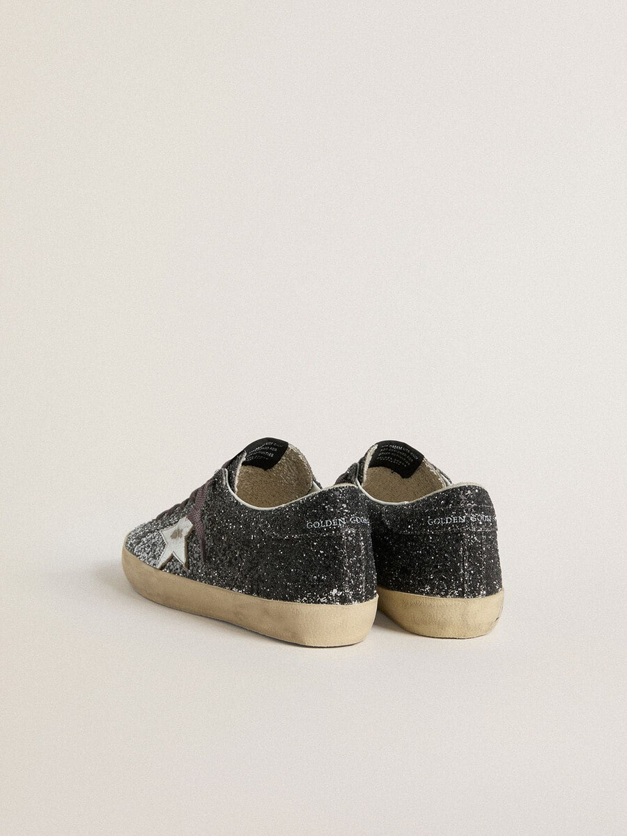super star damenschuh mit glitzerndem obermaterial und silbernem metallic-lederstern