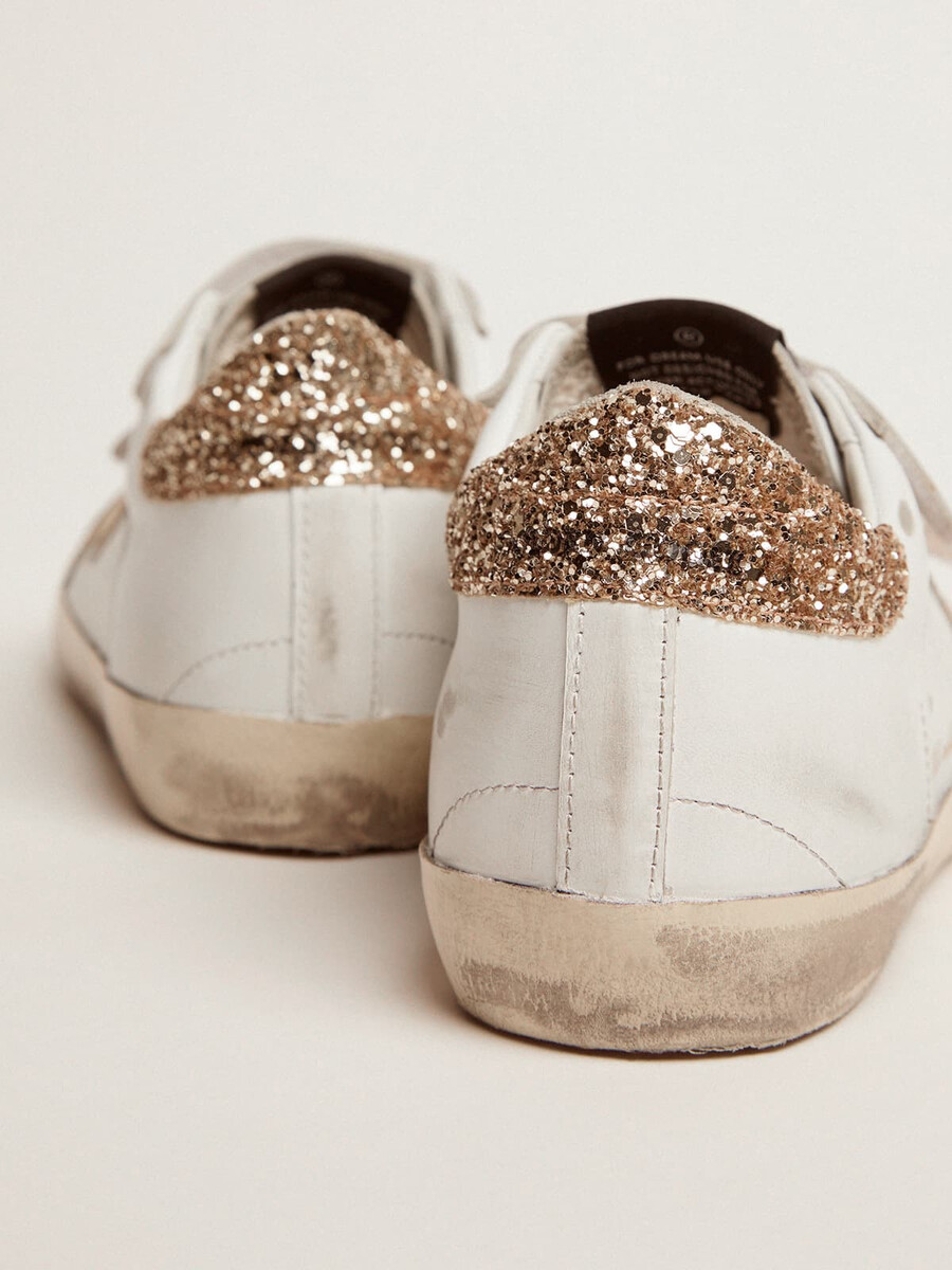 damen-old-school-schuh mit goldenem stern aus laminiertem leder