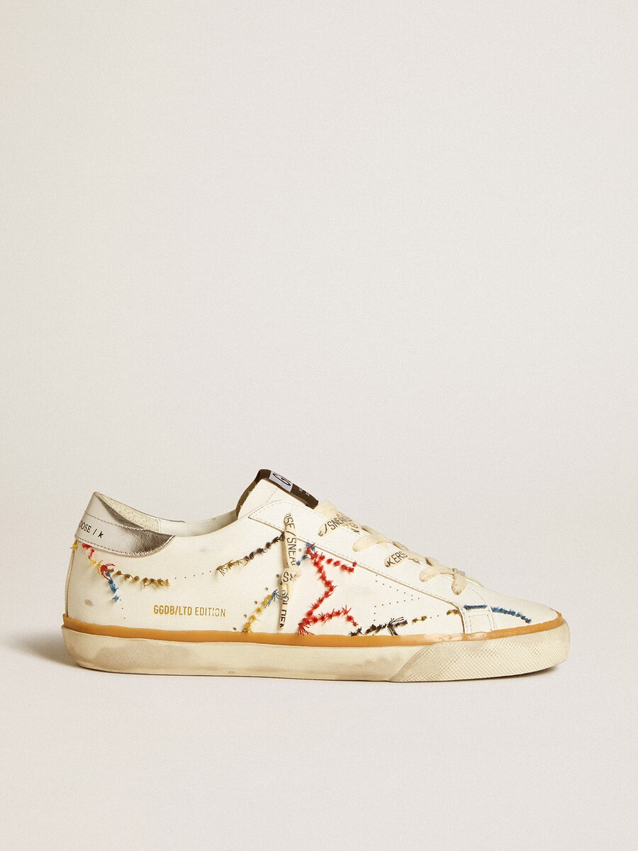 damen-super-star ltd mit perforiertem stern und fersenlasche aus metallic-leder
