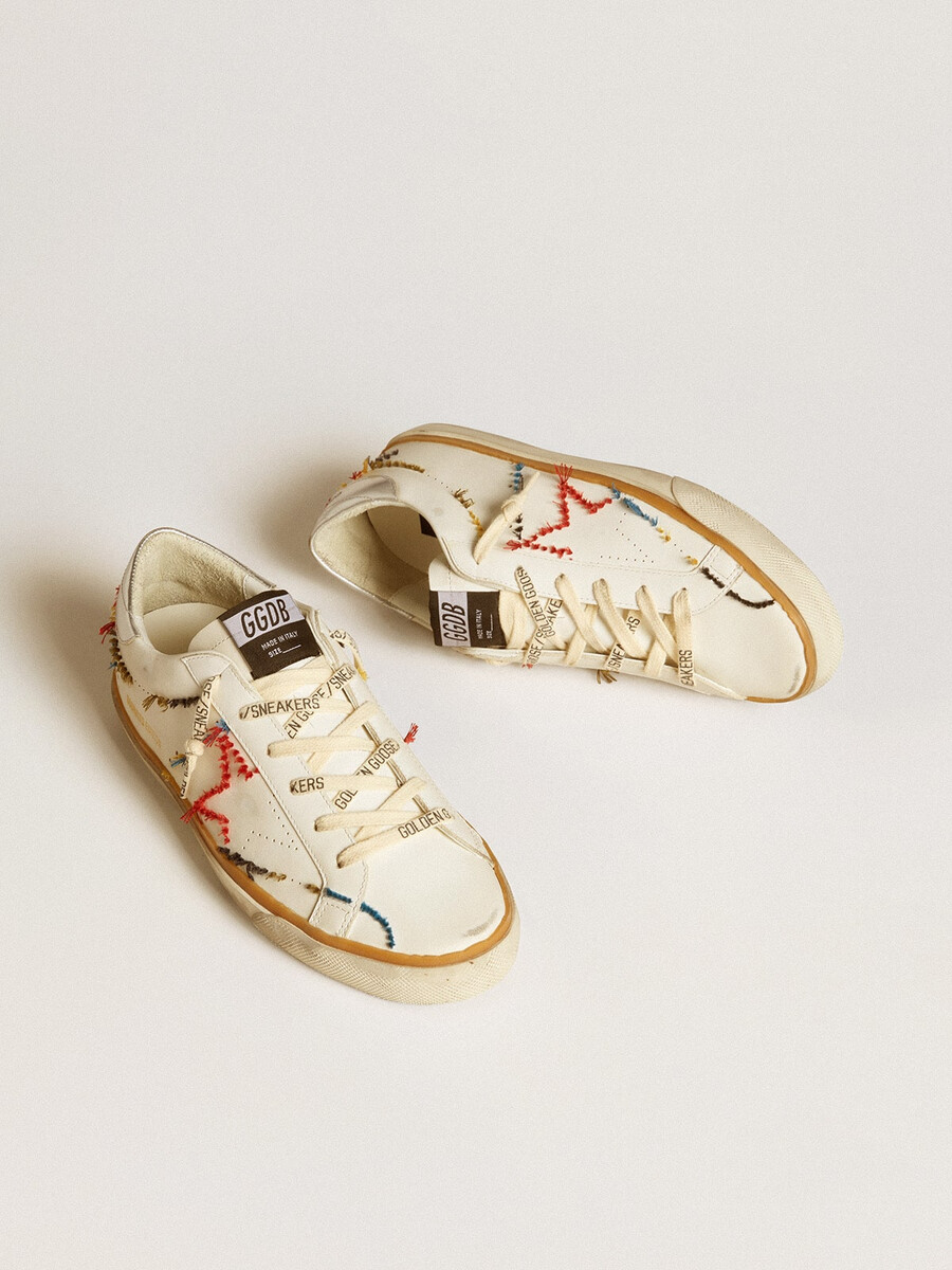 damen-super-star ltd mit perforiertem stern und fersenlasche aus metallic-leder