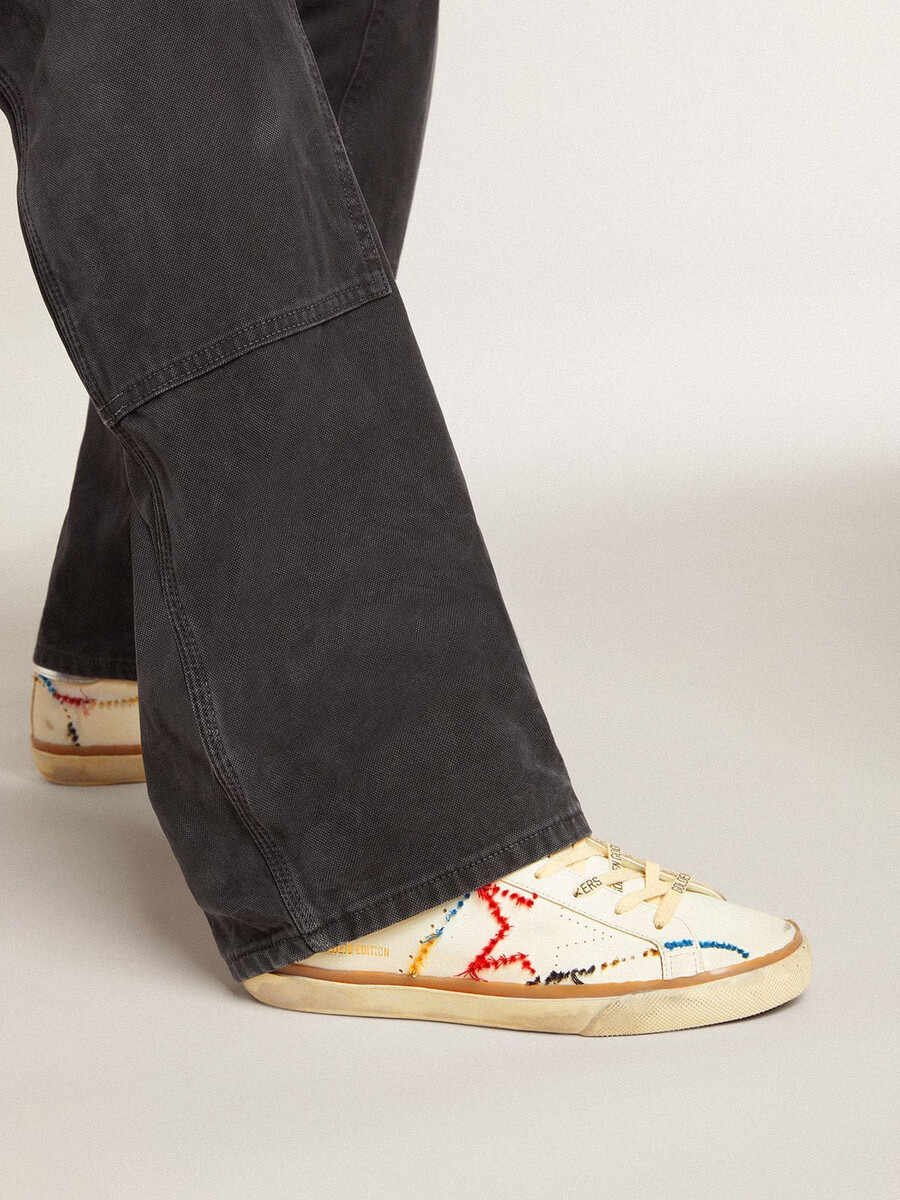 damen-super-star ltd mit perforiertem stern und fersenlasche aus metallic-leder