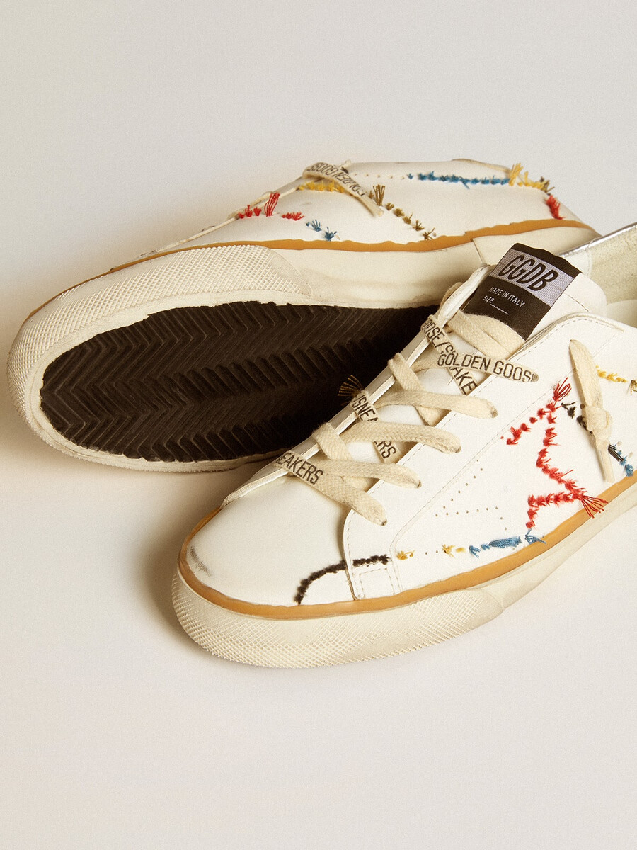 damen-super-star ltd mit perforiertem stern und fersenlasche aus metallic-leder