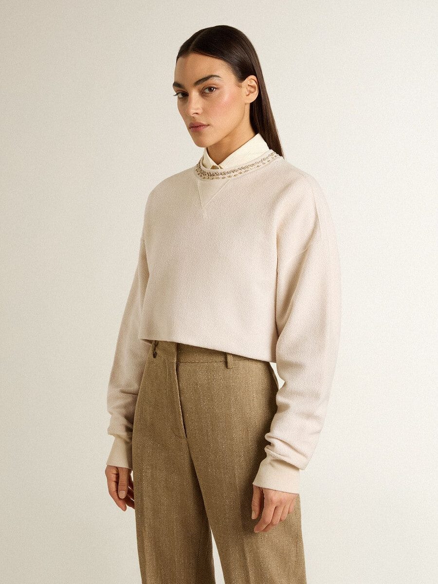 kurzes damen-sweatshirt aus cremefarbener baumwolle mit kristallen auf der vorderseite