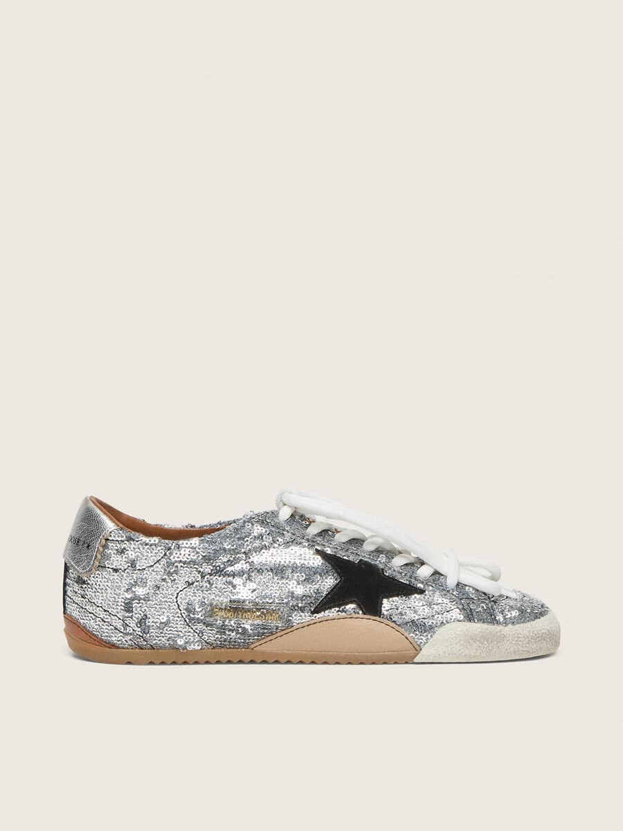 herren-sneaker true-star aus silbernen pailletten mit schwarzem stern und silberner leder-fersenlasche