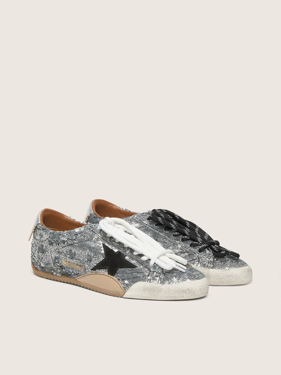 herren-sneaker true-star aus silbernen pailletten mit schwarzem stern und silberner leder-fersenlasche