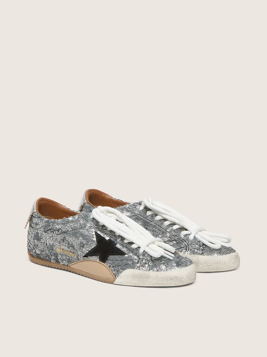 herren-sneaker true-star aus silbernen pailletten mit schwarzem stern und silberner leder-fersenlasche