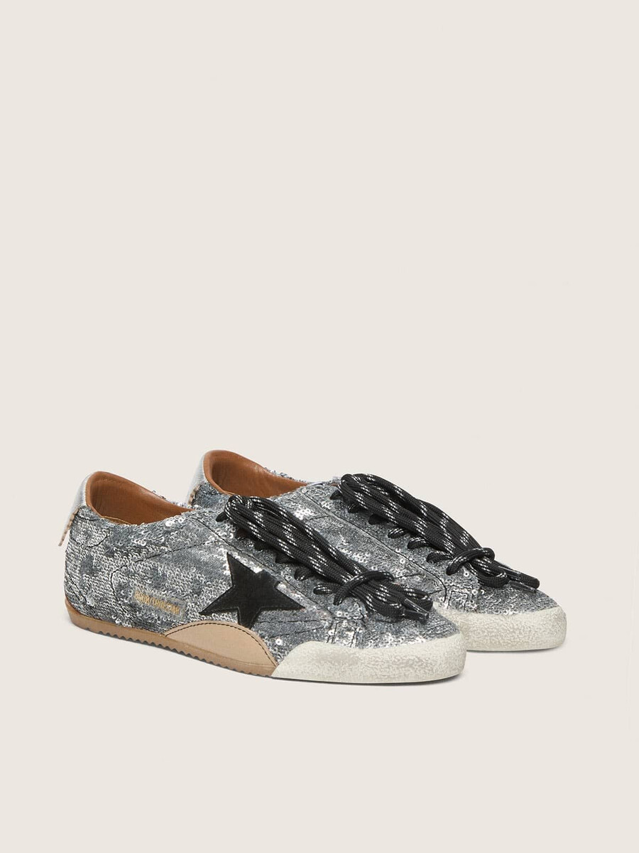 herren-sneaker true-star aus silbernen pailletten mit schwarzem stern und silberner leder-fersenlasche
