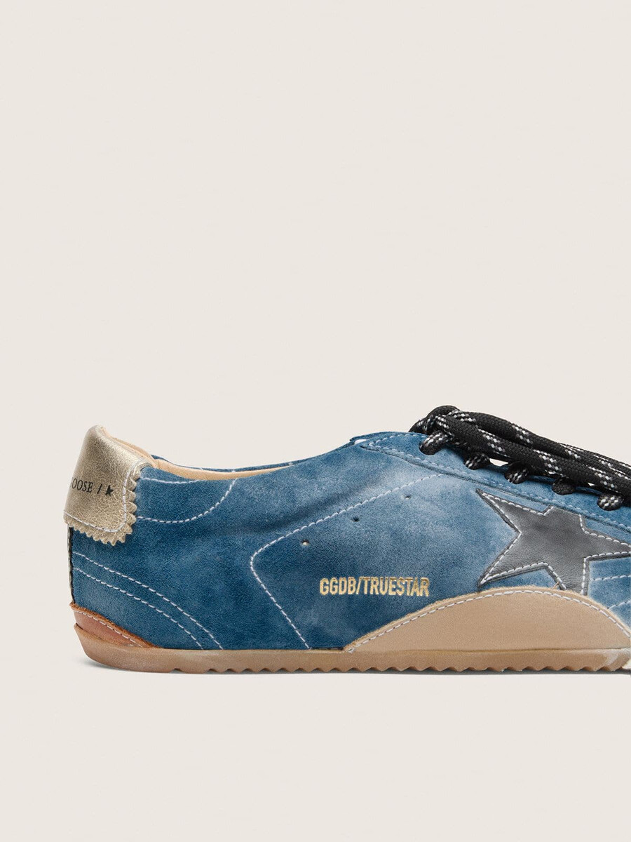 herren-sneaker true-star aus petrolfarbenem wildleder mit schwarzem stern und cremefarbener fersenlasche