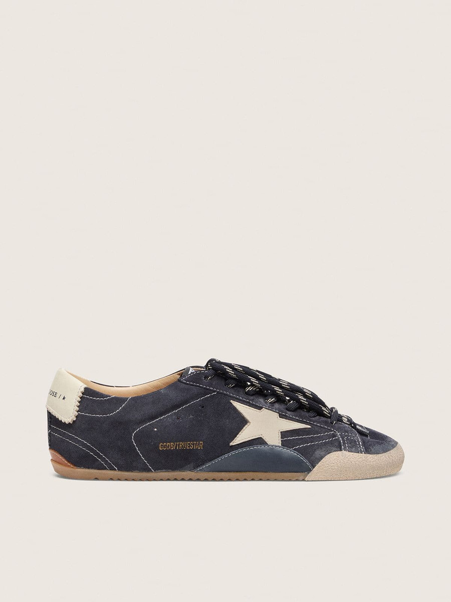 herren-sneaker true-star aus dunkelblauem wildleder mit weißem nappaleder-stern und fersenlasche.
