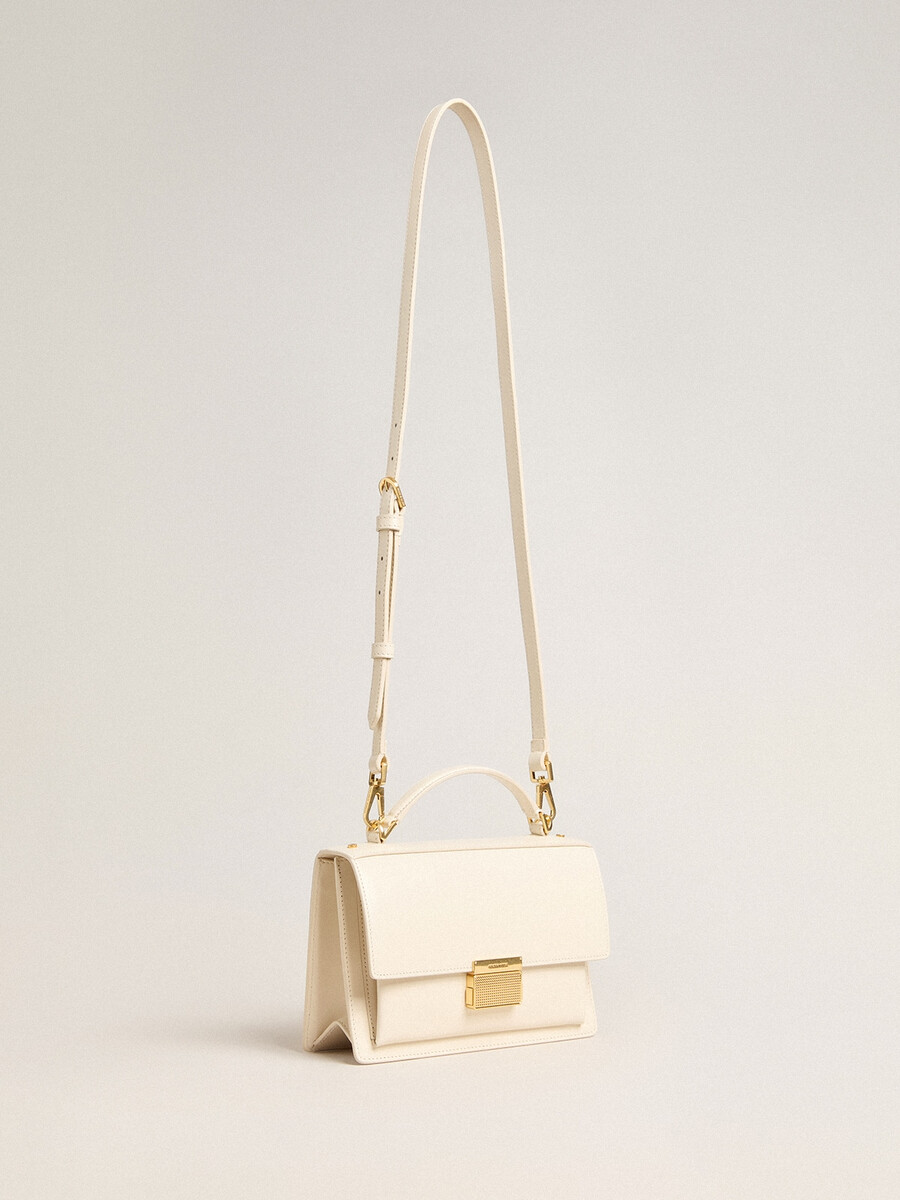venezia tasche aus butterfarbenem gefüttertem leder mit goldenen details