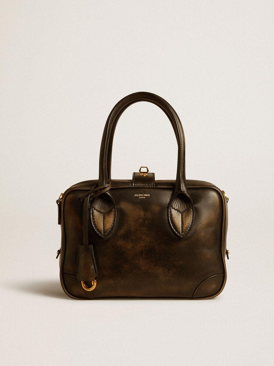 vita-tasche aus schwarzem vintage-leder mit goldenen details