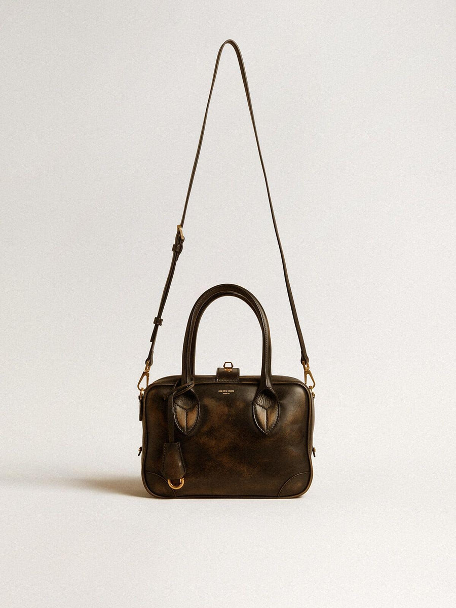 vita-tasche aus schwarzem vintage-leder mit goldenen details